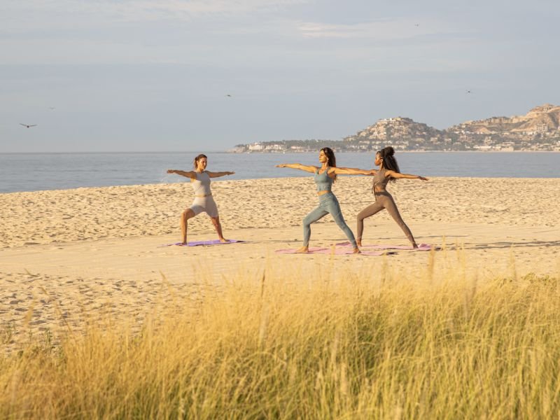 Sunrise yoga on the beach at Viceroy Los Cabos